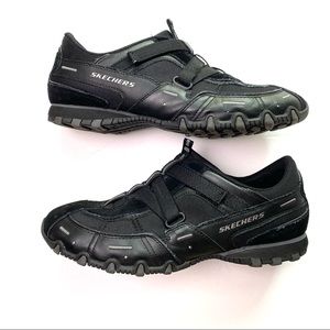 Skechers black slip on sneakers